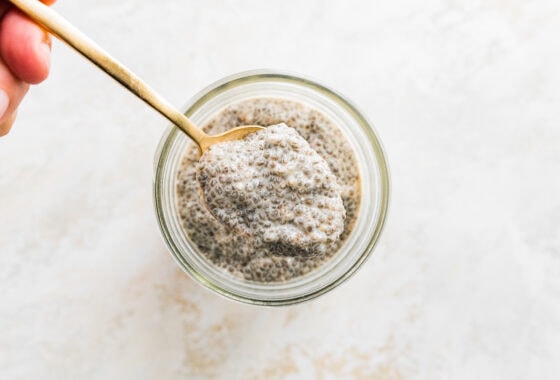 A spoonful of protein chia pudding, showing how thick the mixture should be after sitting overnight.