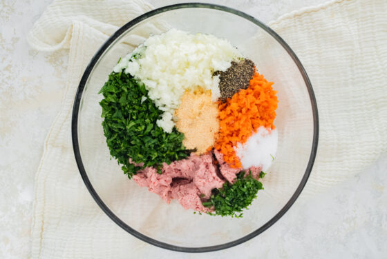 Ingredients for spinach turkey meatballs in a bowl.