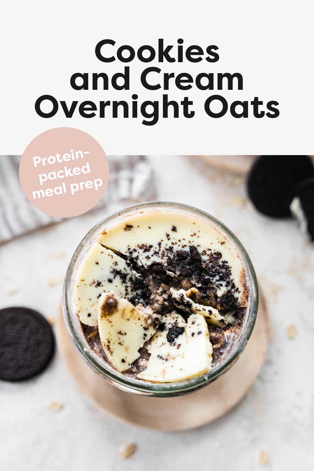 Cookies and cream overnight oats with broken white chocolate magic shell topping.