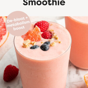 Grapefruit smoothie topped with fresh berries, grapefruit and granola.