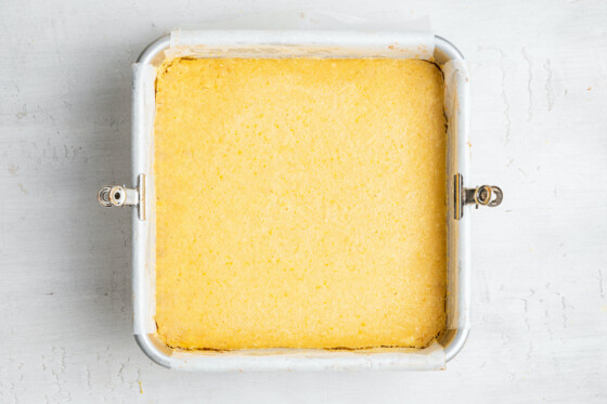 Cooked lemon bars in pan.