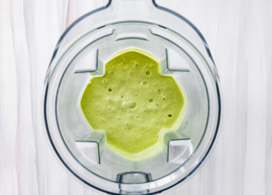 Kiwi smoothie blended in blender.