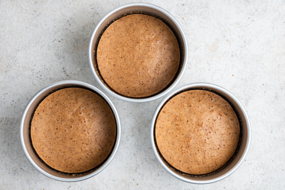 Three layers of cake in three separate round pans.