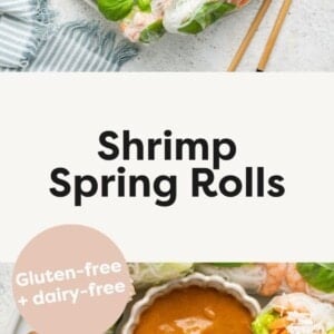 A large white plate containing multiple shrimp spring rolls, some cut in half, and a peanut sauce in a small white bowl. Wooden chopsticks are near the plate, and fresh basil leaves are used as a garnish.