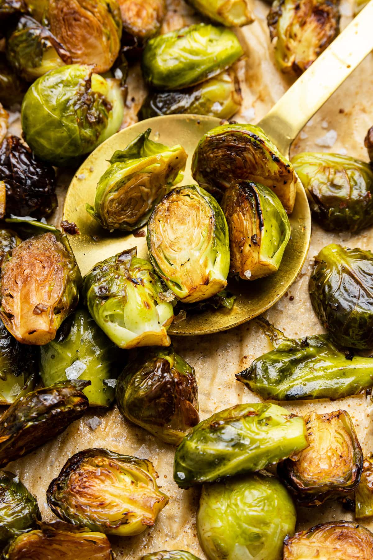 Balsamic Brussels Sprouts on a metal serving spoon.