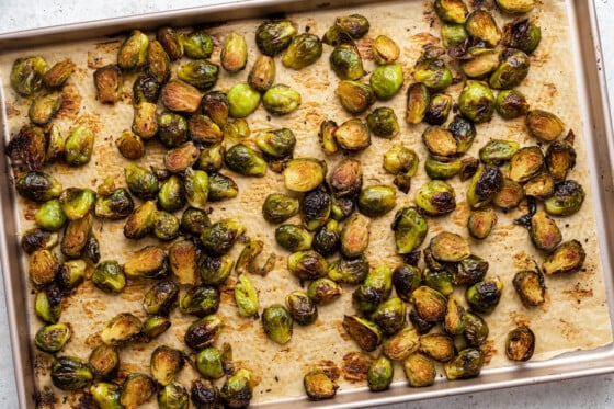 Balsamic Brussels Sprouts on a baking tray after being roasted.