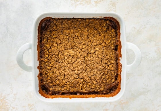 Coffee baked oatmeal in a square baking dish after being baked.