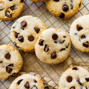 Cottage cheese chocolate chip cookies on a metal cooling rack.
