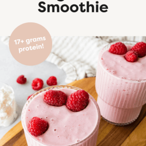 Two cottage cheese smoothies topped with fresh raspberries.