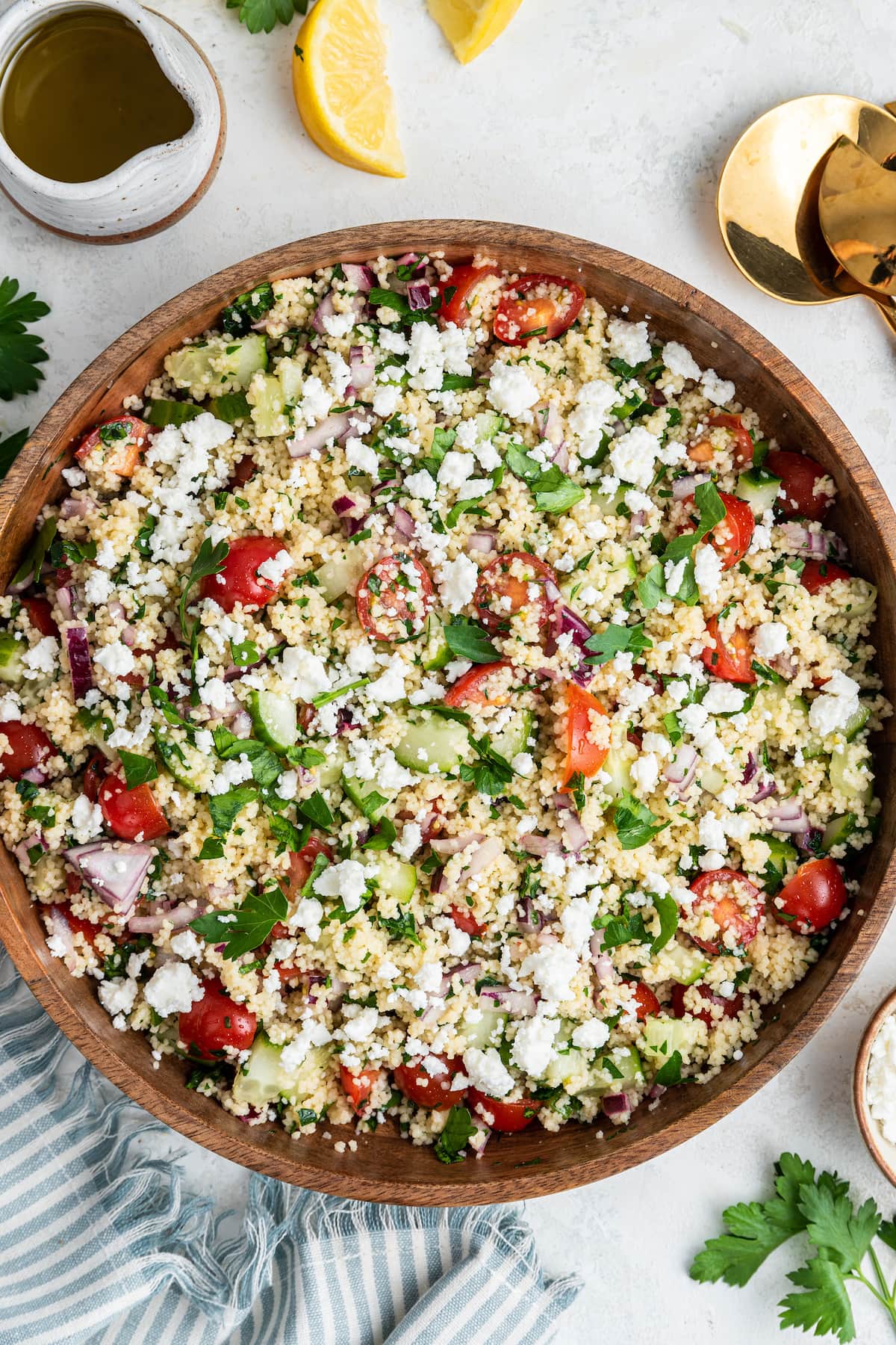 Couscous salad in a large wooden bowl.