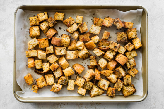 Sourdough croutons on a baking tray.