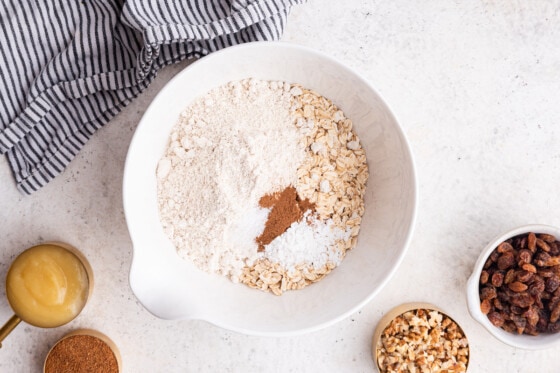 Dry ingredients for the oatmeal breakfast cookies in a large mixing bowl.