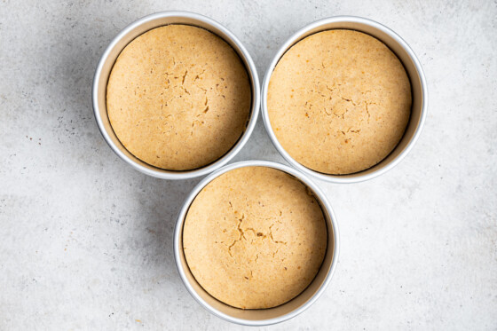 Vanilla cake after being baked in three separate circle cake pans.