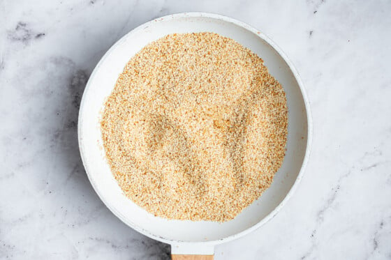 Toasted sesame seeds in a pan.