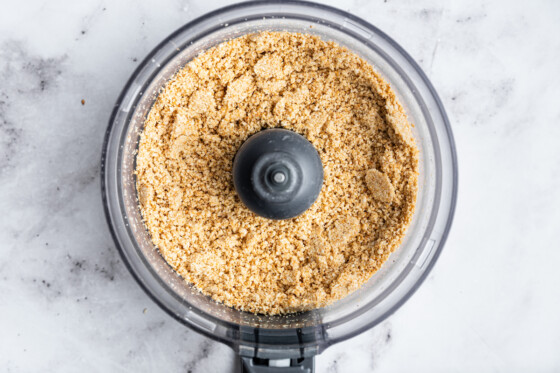 Crumbled sesame seeds in a food processor.