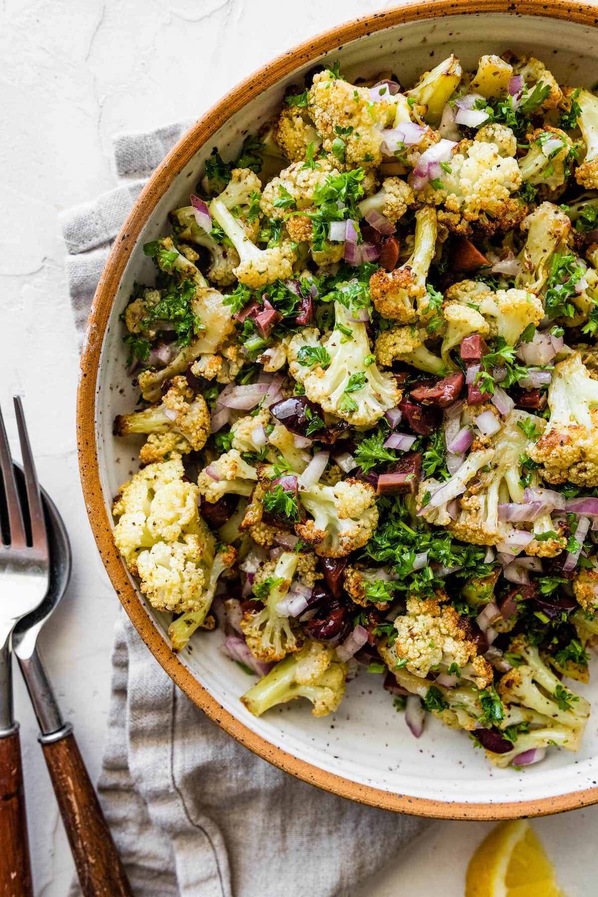 Roasted cauliflower salad in a large bowl.