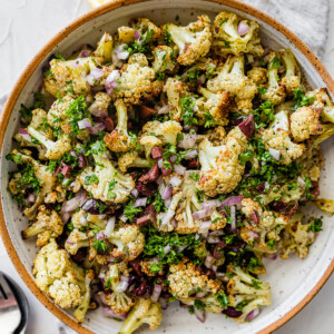 Roasted cauliflower salad in a large bowl.