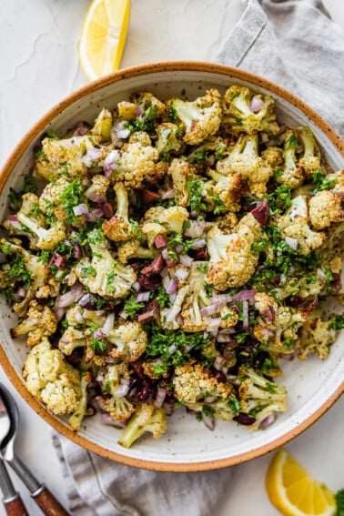 Roasted cauliflower salad in a large bowl.