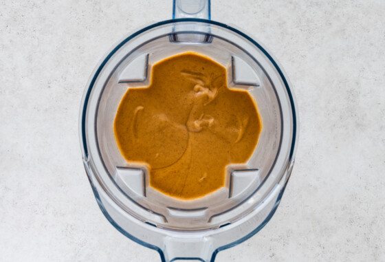 A sweet potato smoothie being blended.