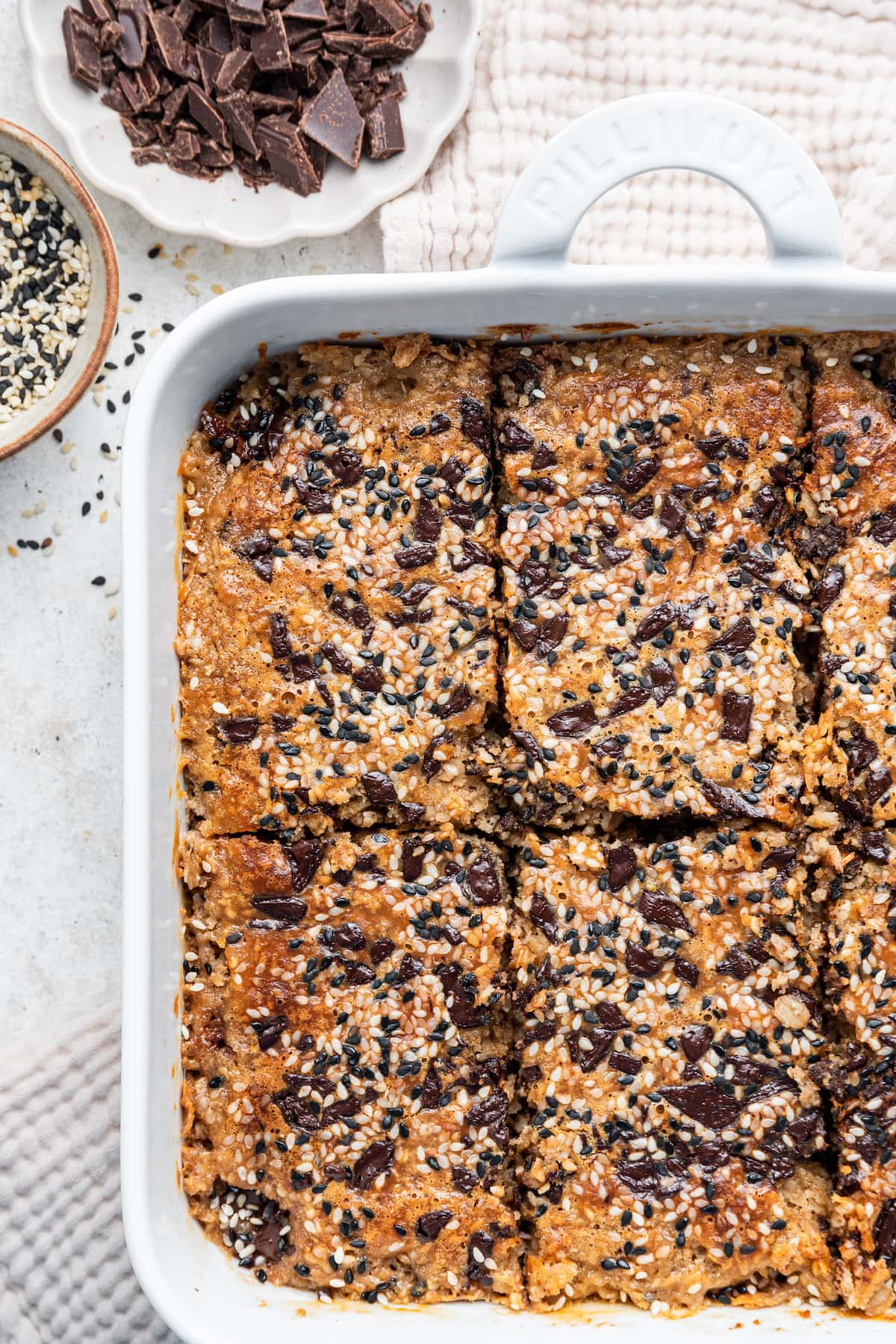 Tahini baked oatmeal in a square baking dish.