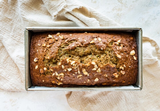 The healthy zucchini bread in a bread pan after being baked.