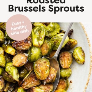 Balsamic Roasted Brussels Sprouts in a bowl with a serving spoon.