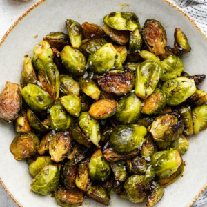 Roasted balsamic Brussels sprouts on a large plate.