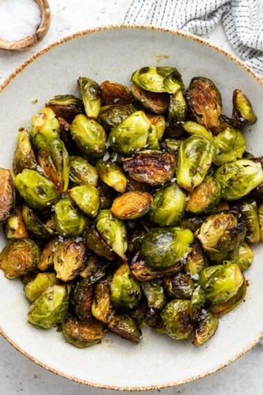Roasted balsamic Brussels sprouts on a large plate.