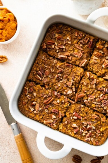 Pumpkin baked oatmeal in a square baking dish.