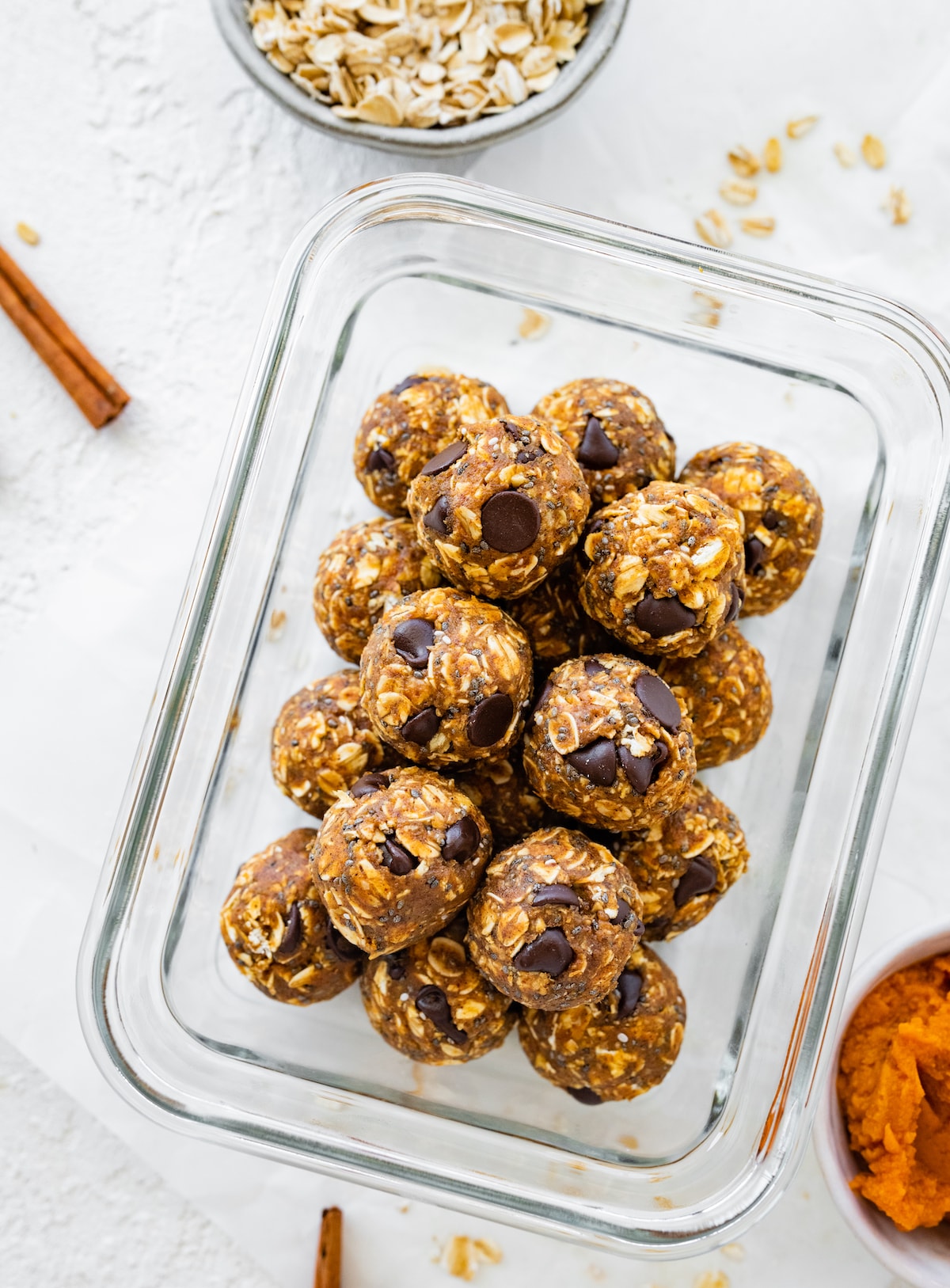 Pumpkin protein balls in a glass container.