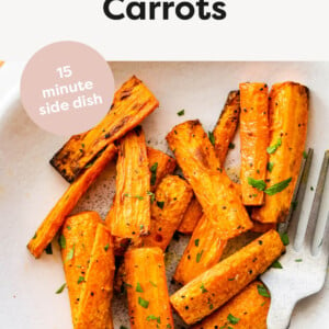 Air Fryer Carrots on a plate with a fork.