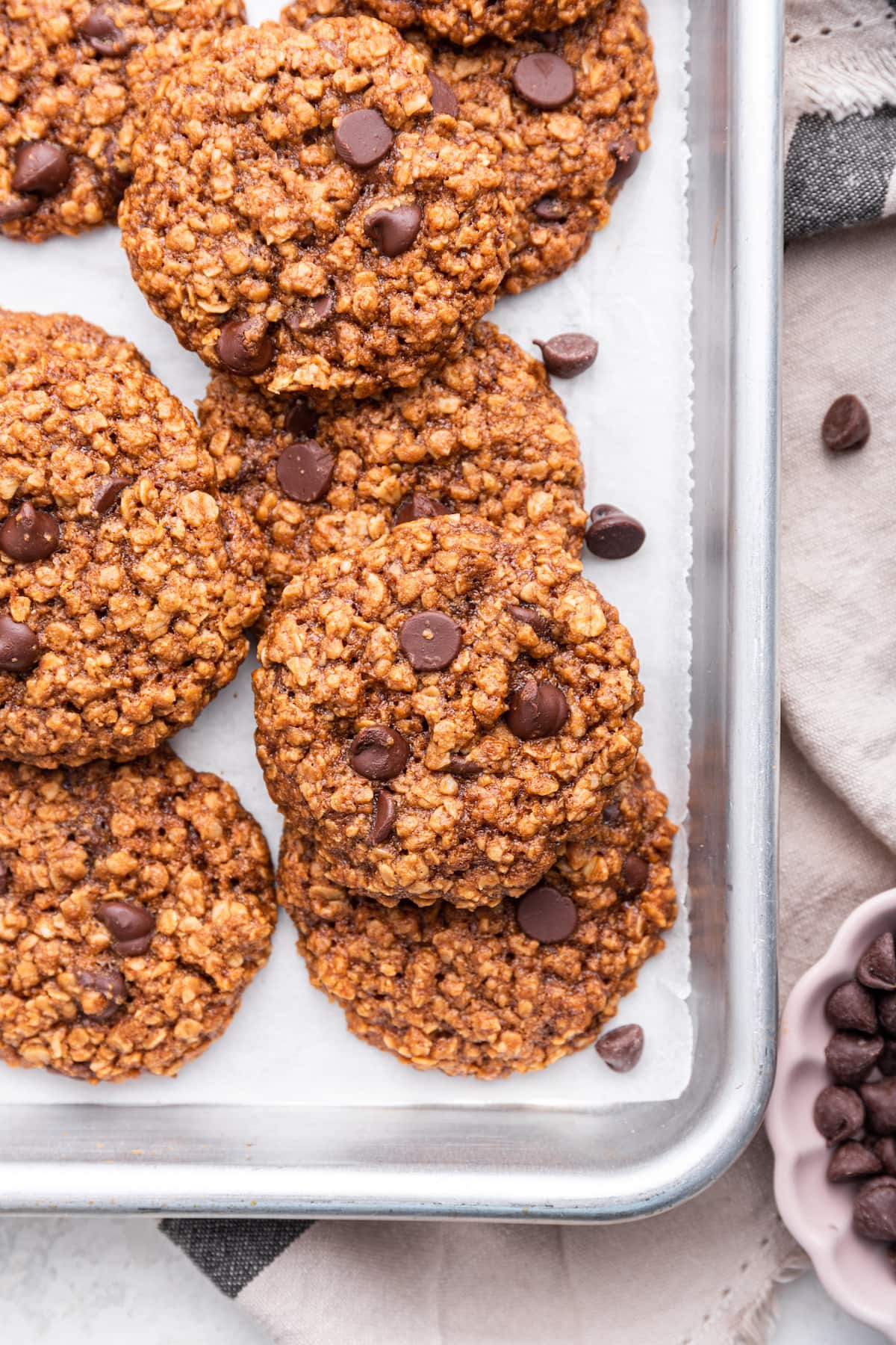 Chocolate chip lactation cookies on a baking sheet.