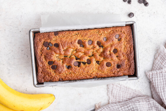 Protein banana bread in a bread pan after being baked.