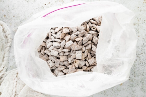 Puppy chow in a large plastic bag.