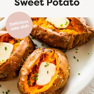 Baked Sweet Potatoes on a plate served with butter and chives.