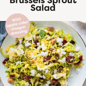 Shaved Brussels Sprout Salad on a plate with a fork.