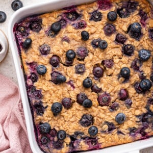 Blueberry baked oatmeal in a square baking dish.