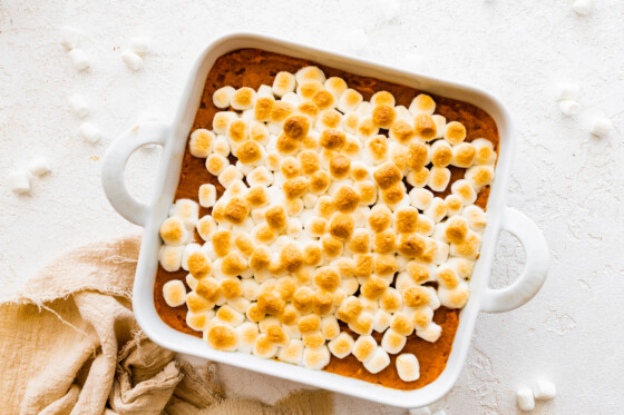 Sweet potato casserole in a square baking dish.