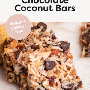 Three Chocolate Coconut Bars stacked next to each other.