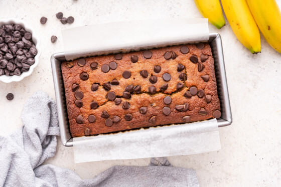 Almond flour banana bread with chocolate chips in a bread pan.