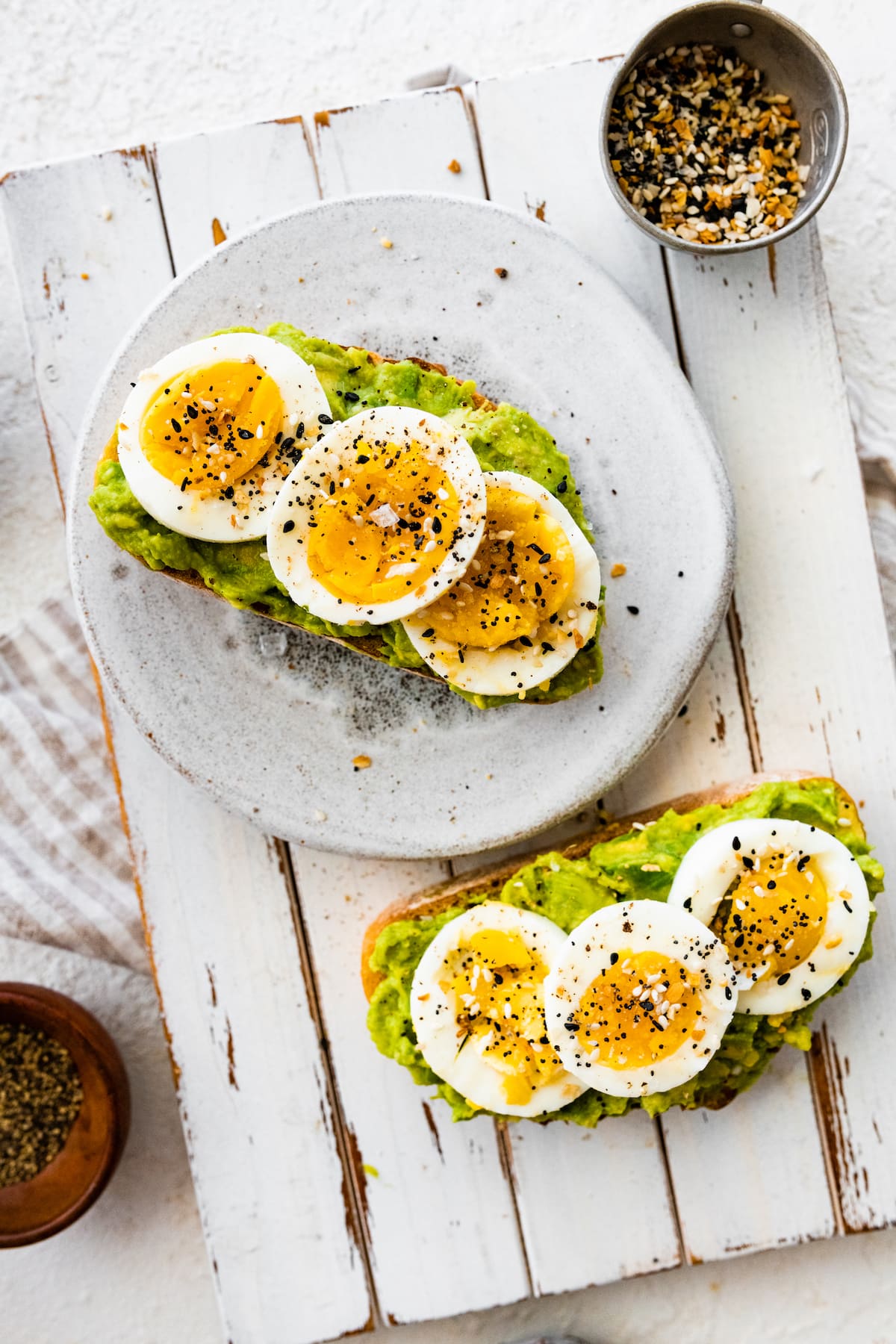 Avocado egg toast on a plate.