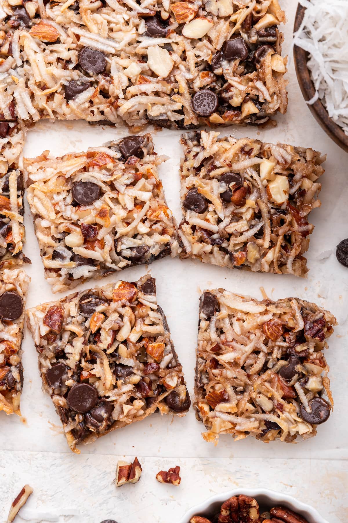 Chocolate coconut bars cut into small squares.