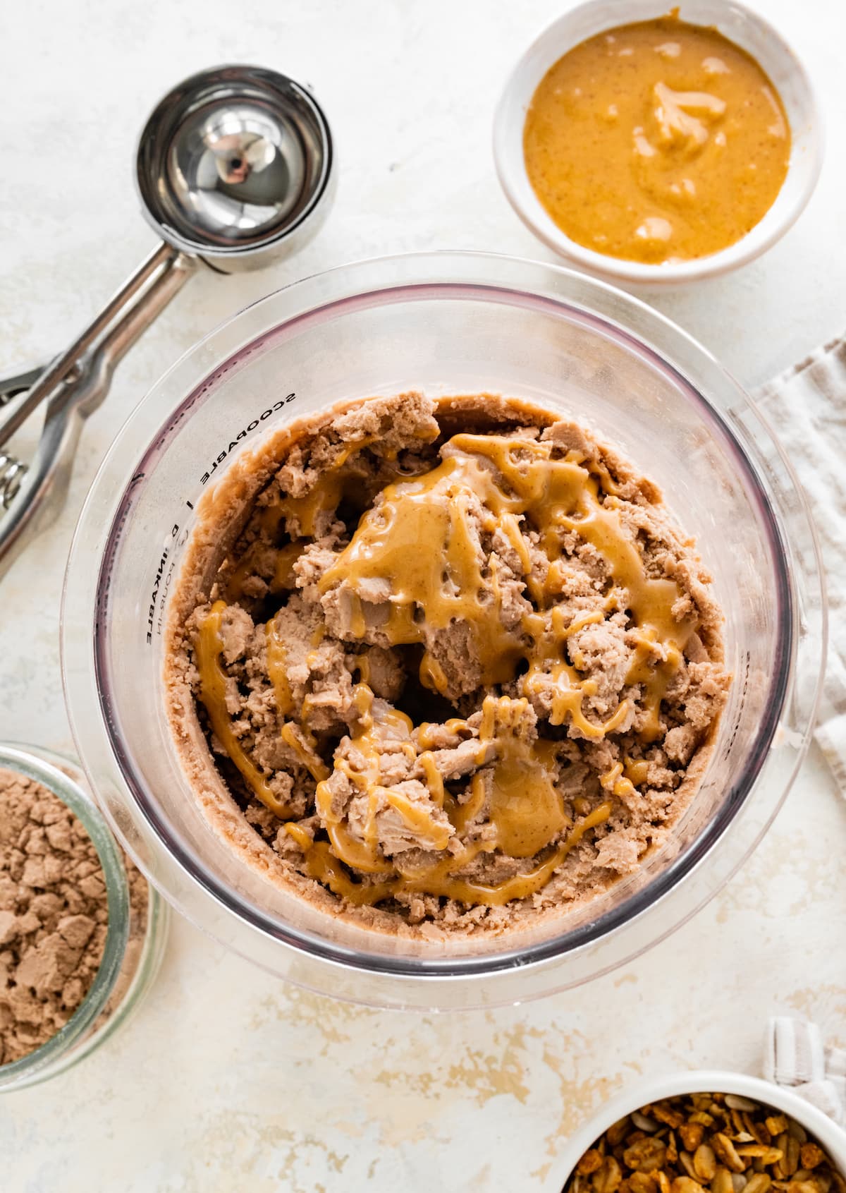 https://www.eatingbirdfood.com/wp-content/uploads/2023/12/chocolate-peanut-butter-ninja-creami-protein-ice-cream-in-creami.jpg