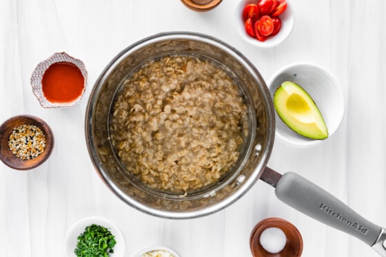 Cooked oatmeal in a pot.