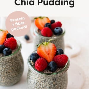 Three jars of Chia Pudding topped with berries.