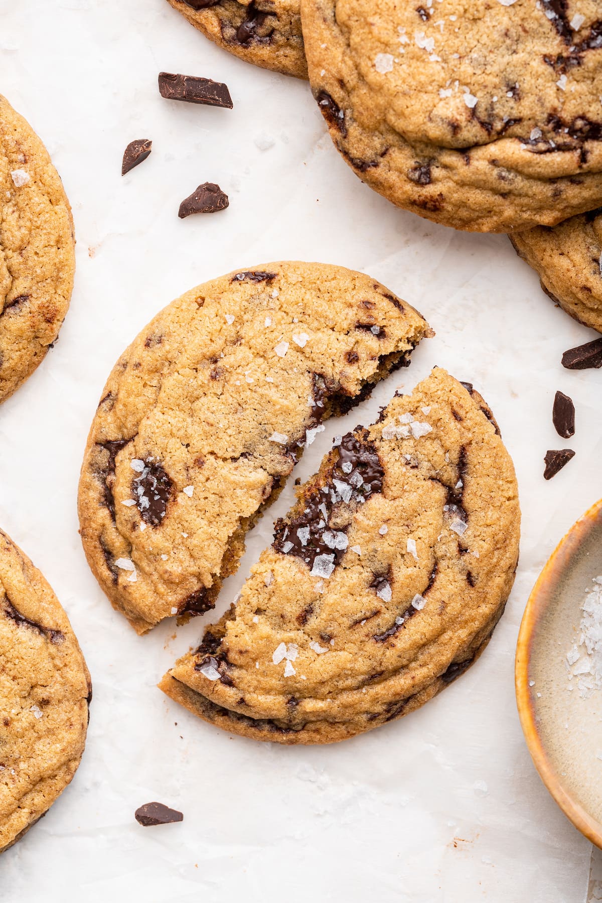 A brown butter chocolate chip cookie split in half.