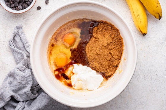 The wet ingredients for the chocolate banana bread in a bowl.