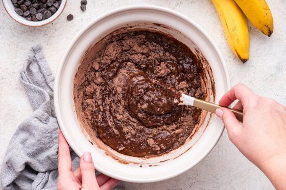 Batter for chocolate banana bread being mixed.