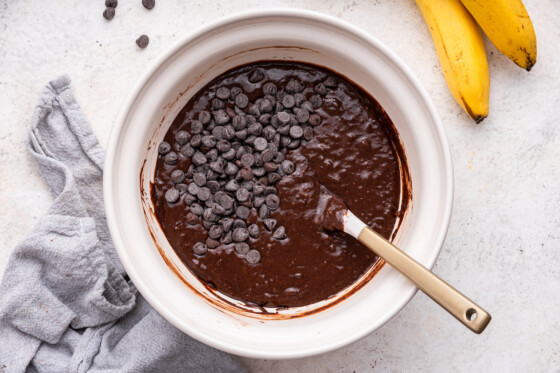 Mixed chocolate banana bread batter with chocolate chips.