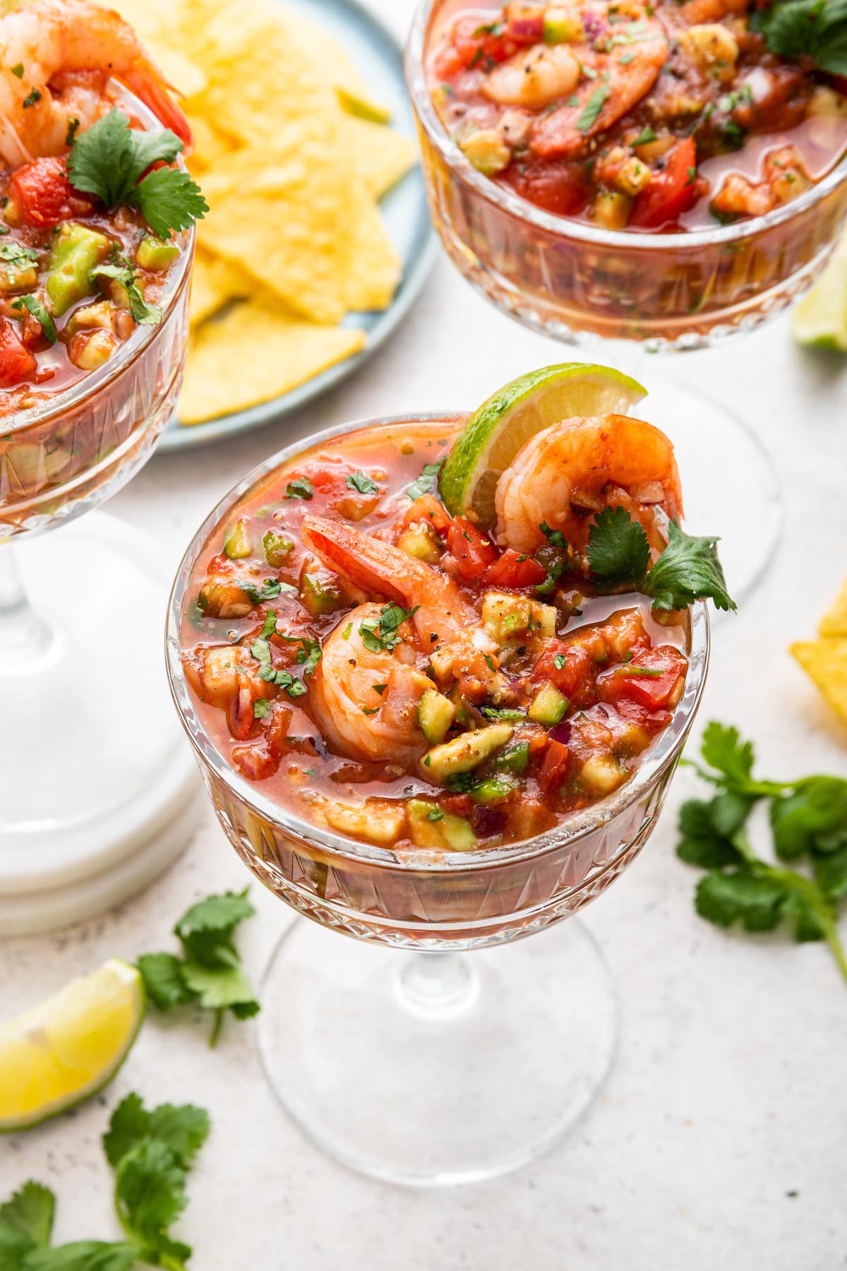 A mexican shrimp cocktail in a small glass.